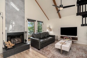 1BR + Loft Lake Chatuge Cabin w/ Mountain Views! (Red Cabin) | Living area | 50-inch Smart TV with digital channels - Tranquille Resort (Hiawassee)