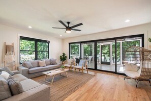 2BR + 2.5BA Lake Chatuge Front Cabin W/ Mountain Views! | Living area | 50-inch Smart TV with digital channels - Tranquille Resort (Hiawassee)