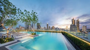 Outdoor pool, open 6:00 AM to 10:00 PM, pool umbrellas, sun loungers