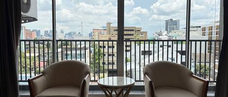 Desk, laptop workspace, bed sheets