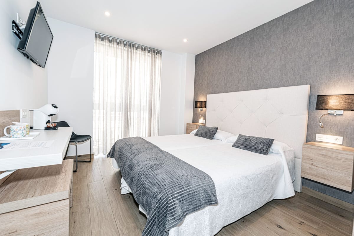 Double Room | Minibar, in-room safe, desk, laptop workspace
