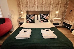Iron/ironing board, travel crib, WiFi, bed sheets