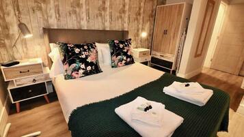 Iron/ironing board, travel crib, WiFi, bed sheets