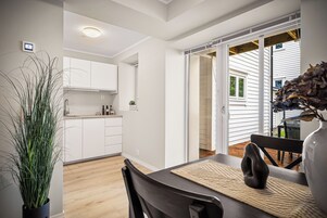 2 bedrooms Apartment (Ground floor) | Private kitchen | Full-size fridge, oven, stovetop, dishwasher