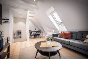 2 bedrooms Apartment (Loft) | Living area | 55-inch flat-screen TV with cable channels - Corner Apartments (Bergen)