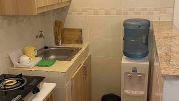 Fridge, microwave, cookware/dishes/utensils