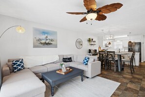 Townhome, Multiple Beds, Patio, Pool View (Slice of Heaven) | Living area | 50-inch flat-screen TV with cable channels, TV - Slice of Heaven Poolside Condo (Panama City Beach)