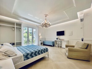 Habitación superior | Escritorio, insonorización, wifi gratis y ropa de cama 