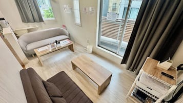House | Living area | 65-inch flat-screen TV with satellite channels