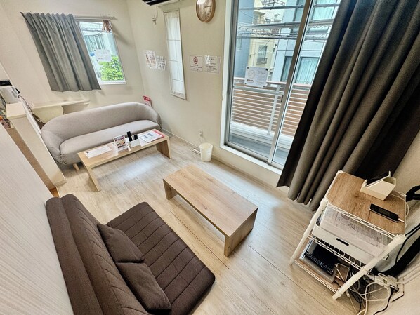 House | Living area | 65-inch flat-screen TV with satellite channels