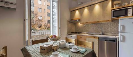 Classic Apartment | Private kitchen | Fridge, microwave, stovetop, dishwasher