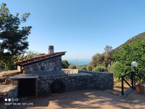 Panoramic hillside house with sea view