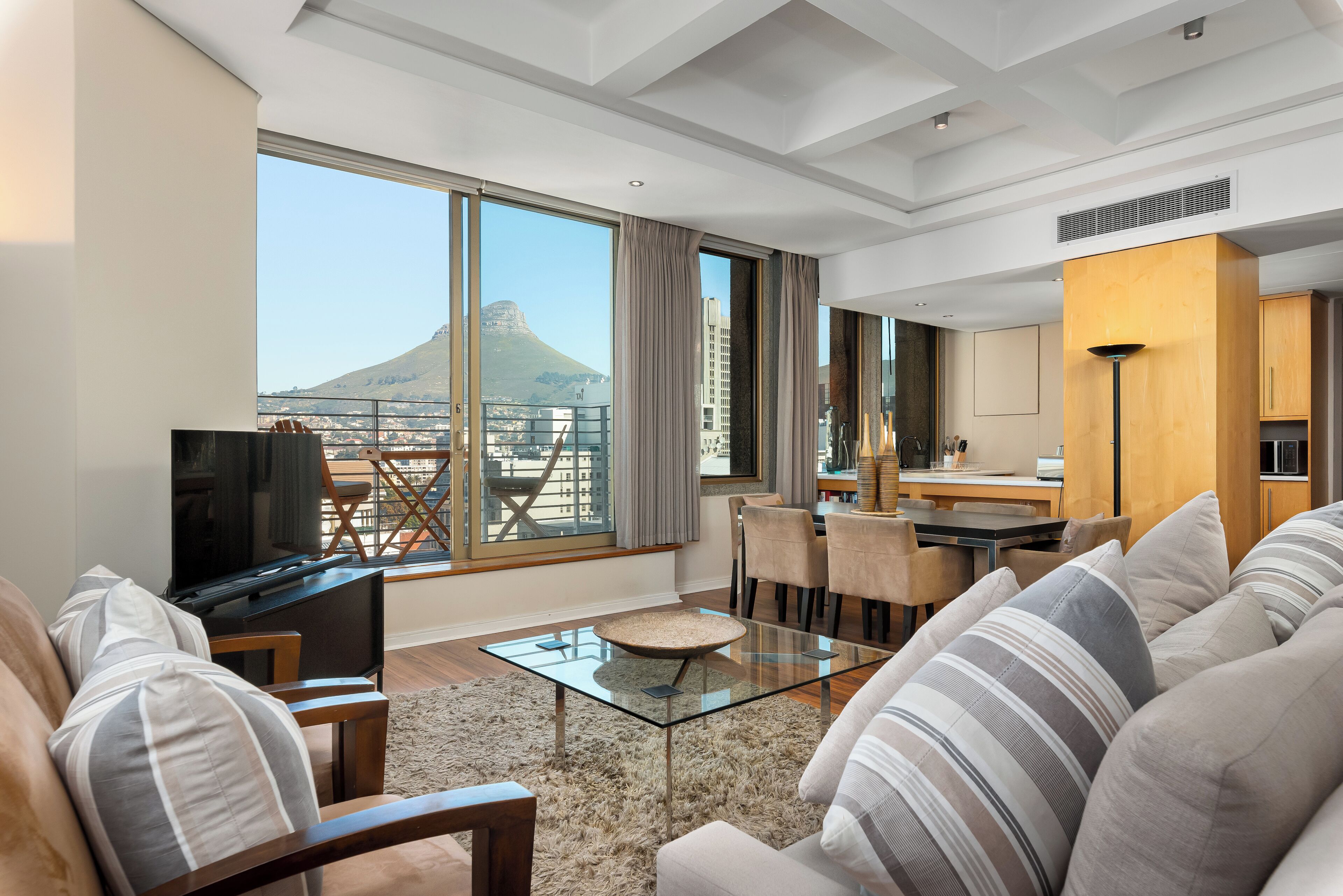 Grand Apartment | Living area | 50-inch flat-screen TV with cable channels, Netflix, streaming services