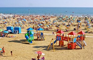 Appartamento, 1 camera da letto, balcone, vista giardino | Spiaggia | Sulla spiaggia