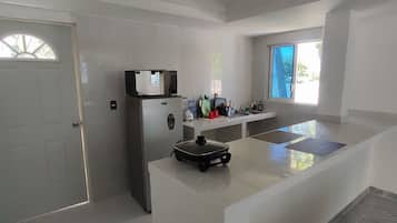 Fridge, microwave, cookware/dishes/utensils