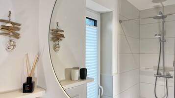 Condo | Bathroom | Shower, hair dryer, towels
