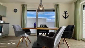 Condo | Living area | Flat-screen TV, heated floors