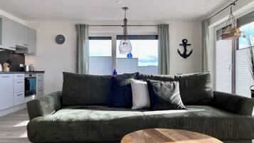 Condo | Living area | Flat-screen TV, heated floors