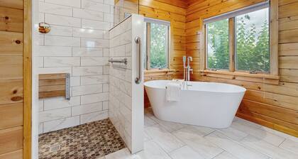 Beautiful lake view home with decks, grill, soaking tub & fireplace