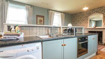 Fridge, electric kettle, cookware/dishes/utensils