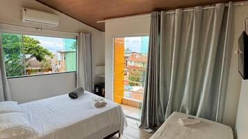 Panoramic Triple Room, Patio, Sea View | Minibar, free WiFi, bed sheets