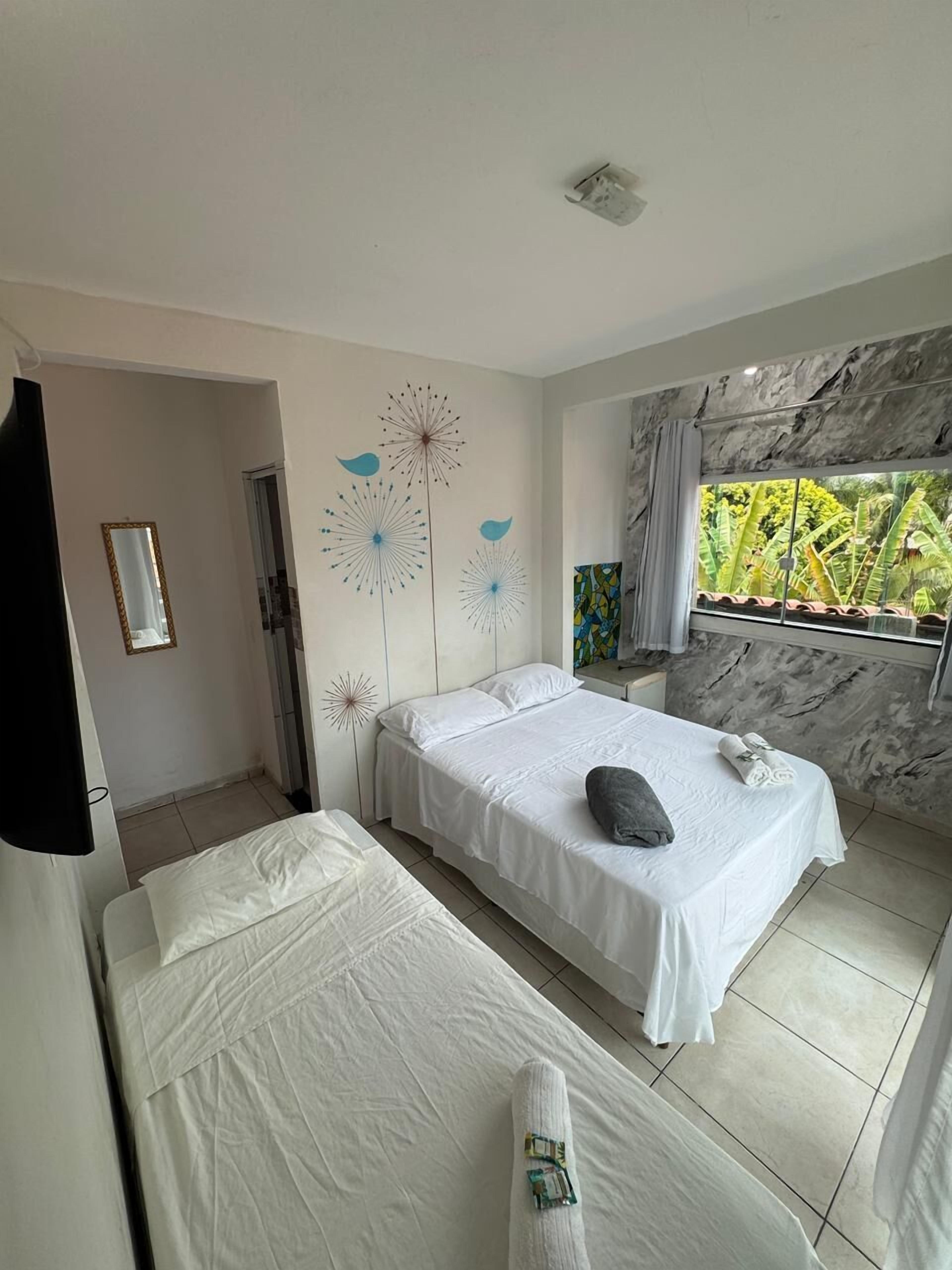 Standard Triple Room, Patio, City View | Minibar, free WiFi, bed sheets