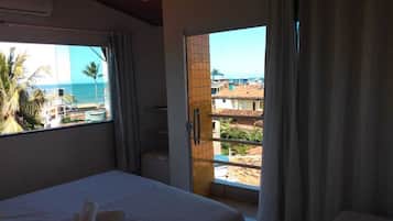 Panoramic Triple Room, Patio, Sea View | Minibar, free WiFi, bed sheets