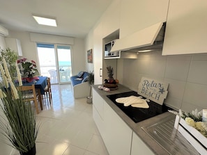 Apartamento, 1 quarto, sacada, vista para o oceano | Parte interna