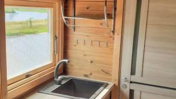 Fridge, microwave, cookware/dishes/utensils