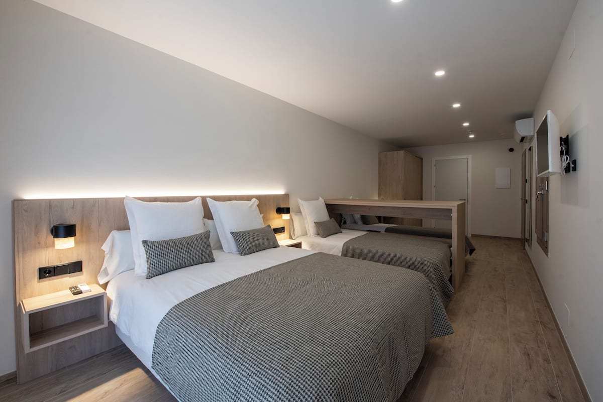 Basic Quadruple Room, Accessible | 1 bedroom, in-room safe, desk, laptop workspace
