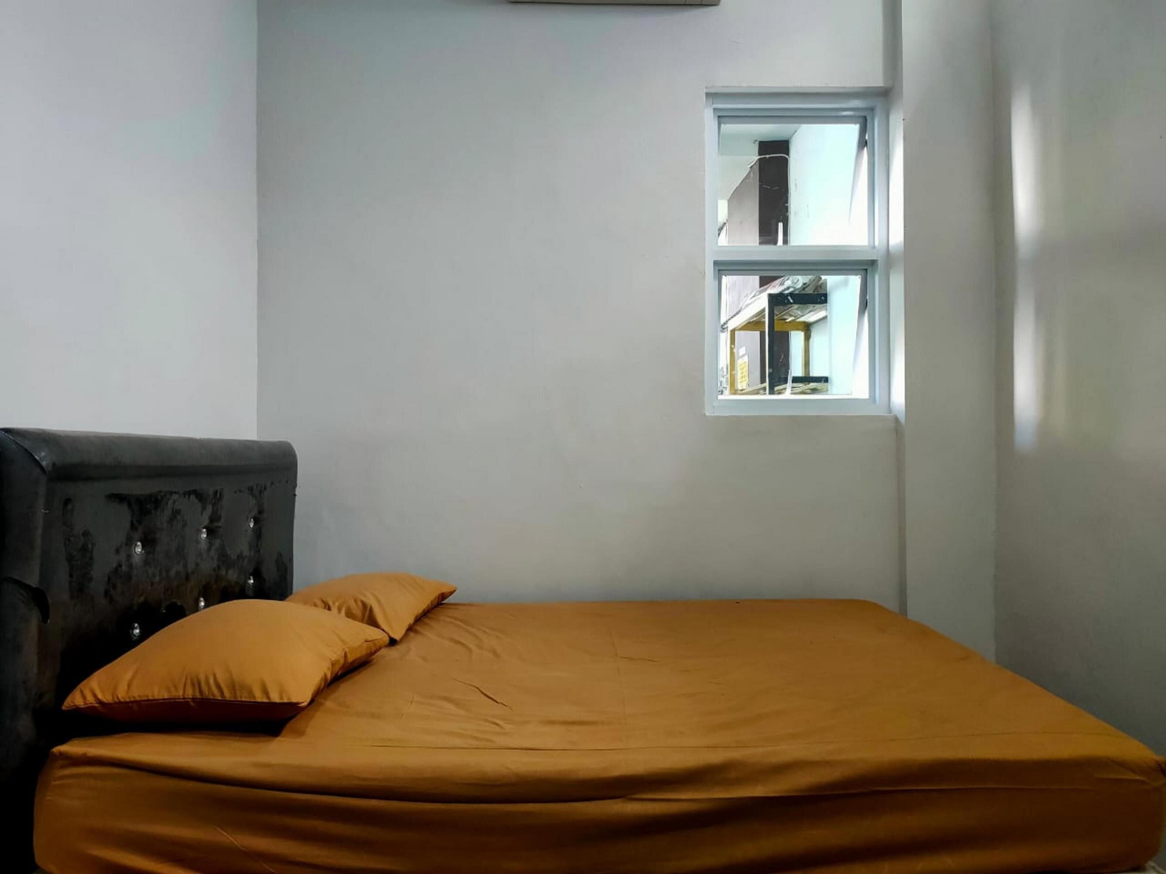 Espacio para trabajar con laptop, wifi gratis y ropa de cama 