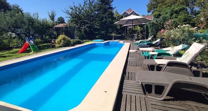 Holiday apartment with pool and playground