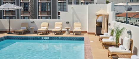 Outdoor pool, open 9:00 AM to 9:00 PM, sun loungers