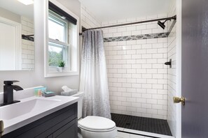 Bathtub, hair dryer, towels