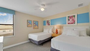 A hotel room with two beds, a ceiling fan, artwork on the walls, and a window with blinds. - 8BR Champions Gate Pool Home | 5 King Beds | Theater Room | Dog Friendly (Champions Gate)