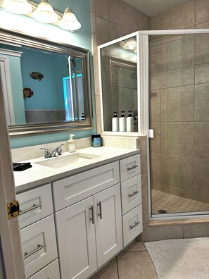 Shower, hair dryer, towels, soap