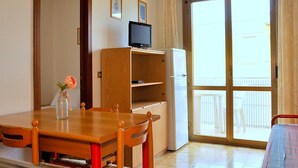 Apartment, 1 Bedroom, Balcony | Dining - Luminous Flat 400 m From the Beach for 4 Guests (San Michele al Tagliamento)
