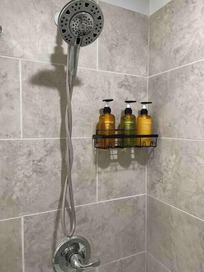 Shower, hair dryer, towels, soap