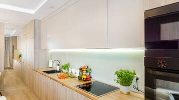 Exclusive Apartment | Private kitchen | Fridge, microwave, oven, stovetop