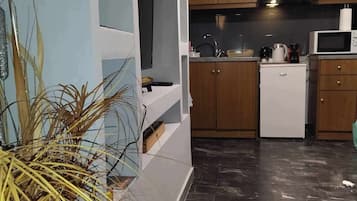 Apartamento | Zona de estar | Televisión LED de 32 pulgadas con canales digitales