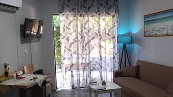 Estúdio | Área de estar | TV LED 32 polegadas com canais digitais