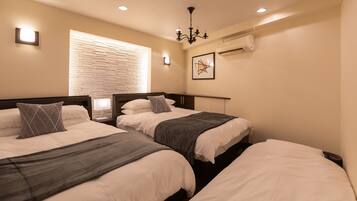 Deluxe House | Individually decorated, individually furnished, desk, blackout drapes