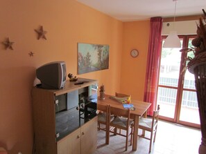 Apartment, 1 Bedroom, Balcony | Dining room - Homely Apartment With Shared Pools - Beahost (San Michele al Tagliamento)