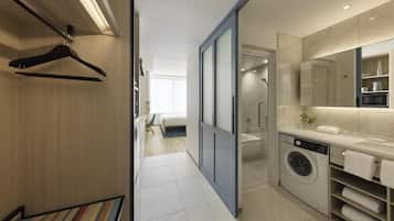 Enjoy a well-appointed space with a bed, bathroom, and ample storage.
