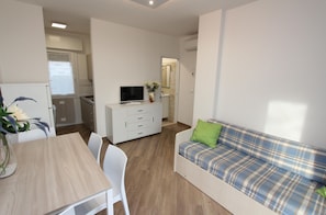 Appartement, 2 chambres, patio, vue jardin | Salle de séjour
