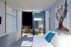 Deluxe Suite | 1 bedroom, premium bedding, in-room safe, blackout drapes