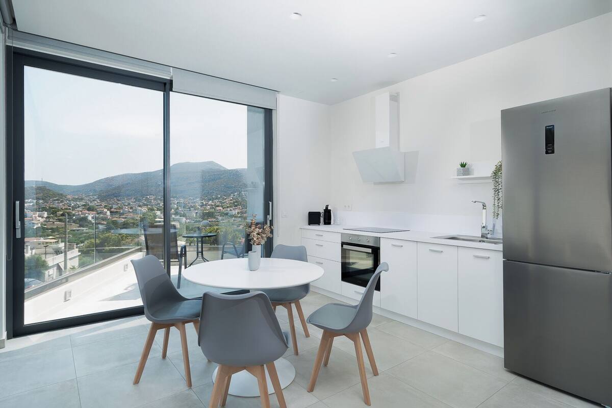 luxury suite | private kitchen | full-sized fridge, oven, stovetop, electric kettle