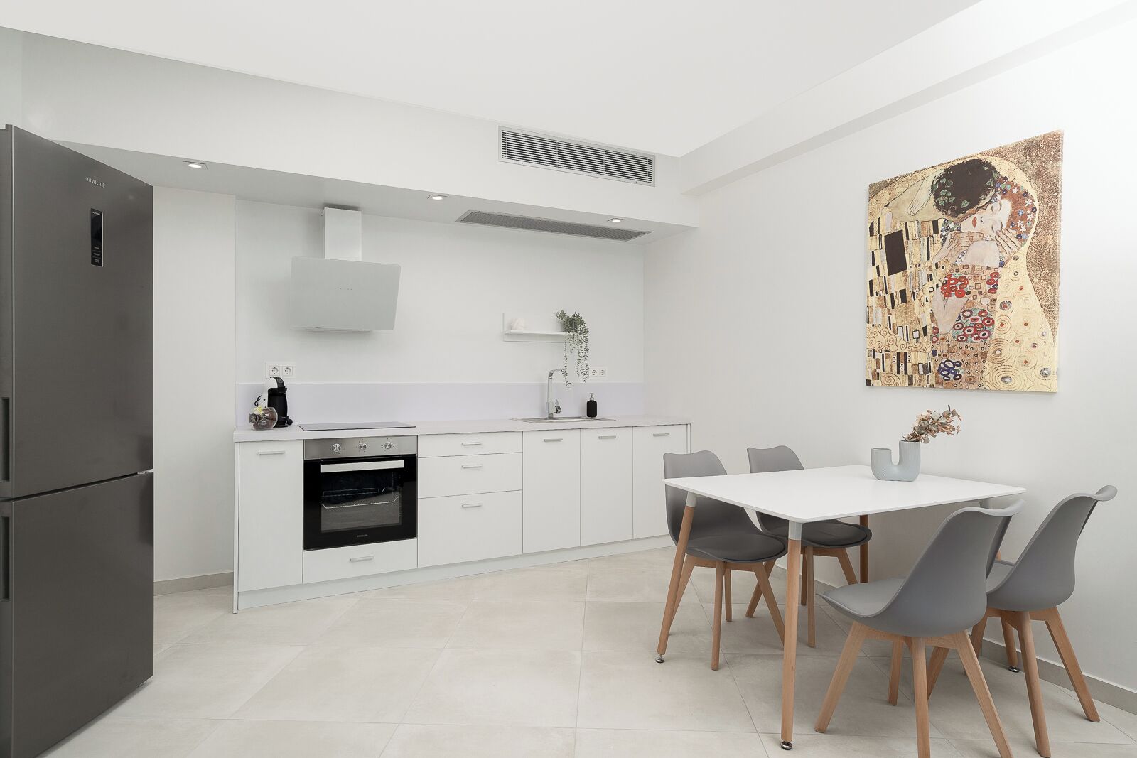 deluxe suite | private kitchen | full-sized fridge, oven, stovetop, electric kettle