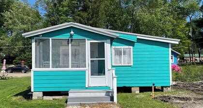 The Hummingbird rustic lakefront cottage at The Pier at Canadohta Lake sleeps 7!