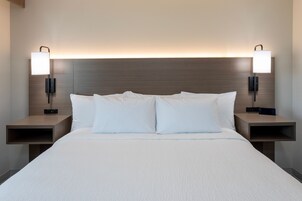 Tabla de planchar con plancha, wifi gratis y ropa de cama 